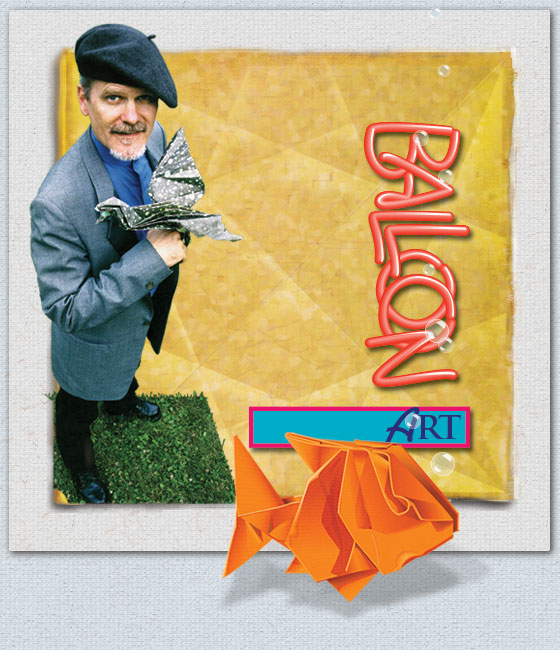 Michael Roy standing holding green with white spots origami Archaeopteryx. Standing on grass square above creased parchment square. Also balloon art and origami sunfish on the lower part of the image.